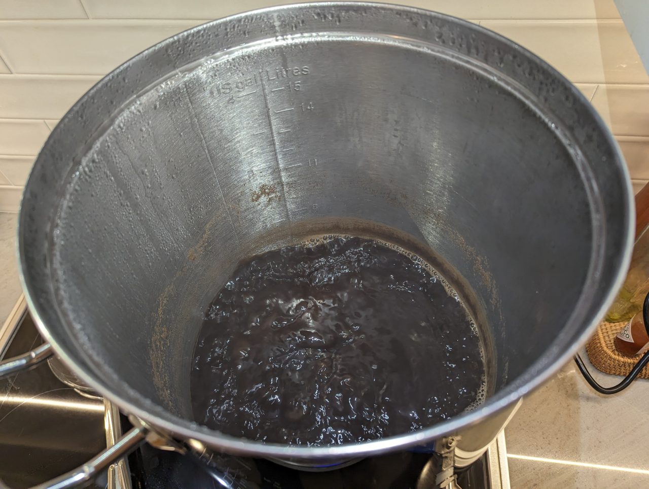 Photo of a batch of Irish Stout boiling in an electric brewing kettle
