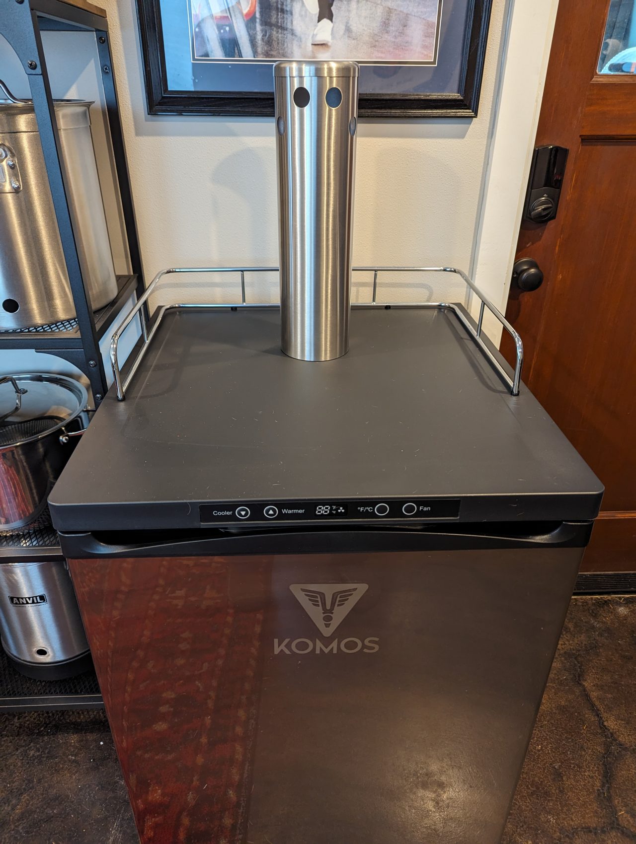 Photo of a stainless steel tap tower attached to a kegerator