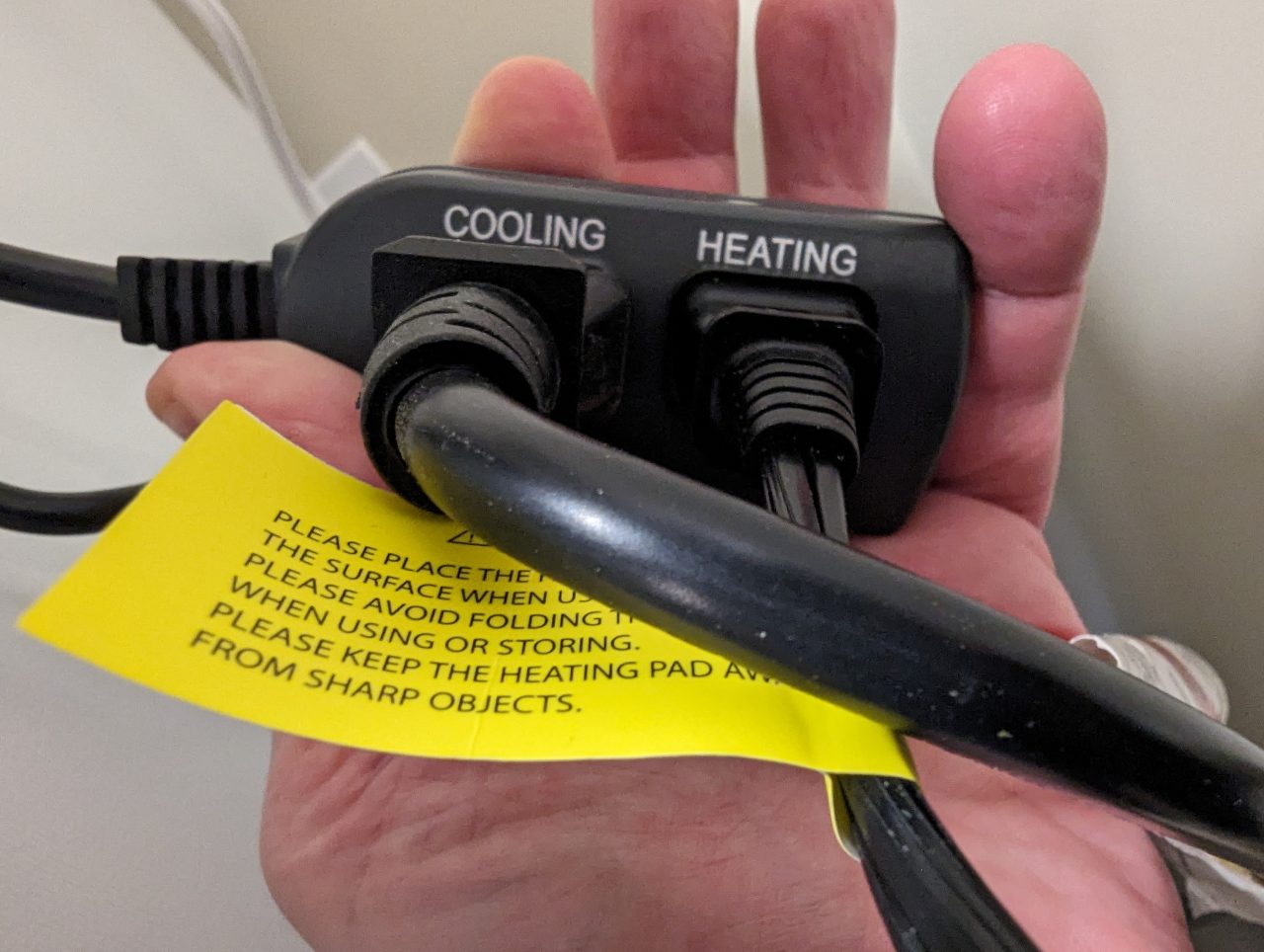 Photo of the cooling and heating electrical plugs on an Inkbird temperature controller