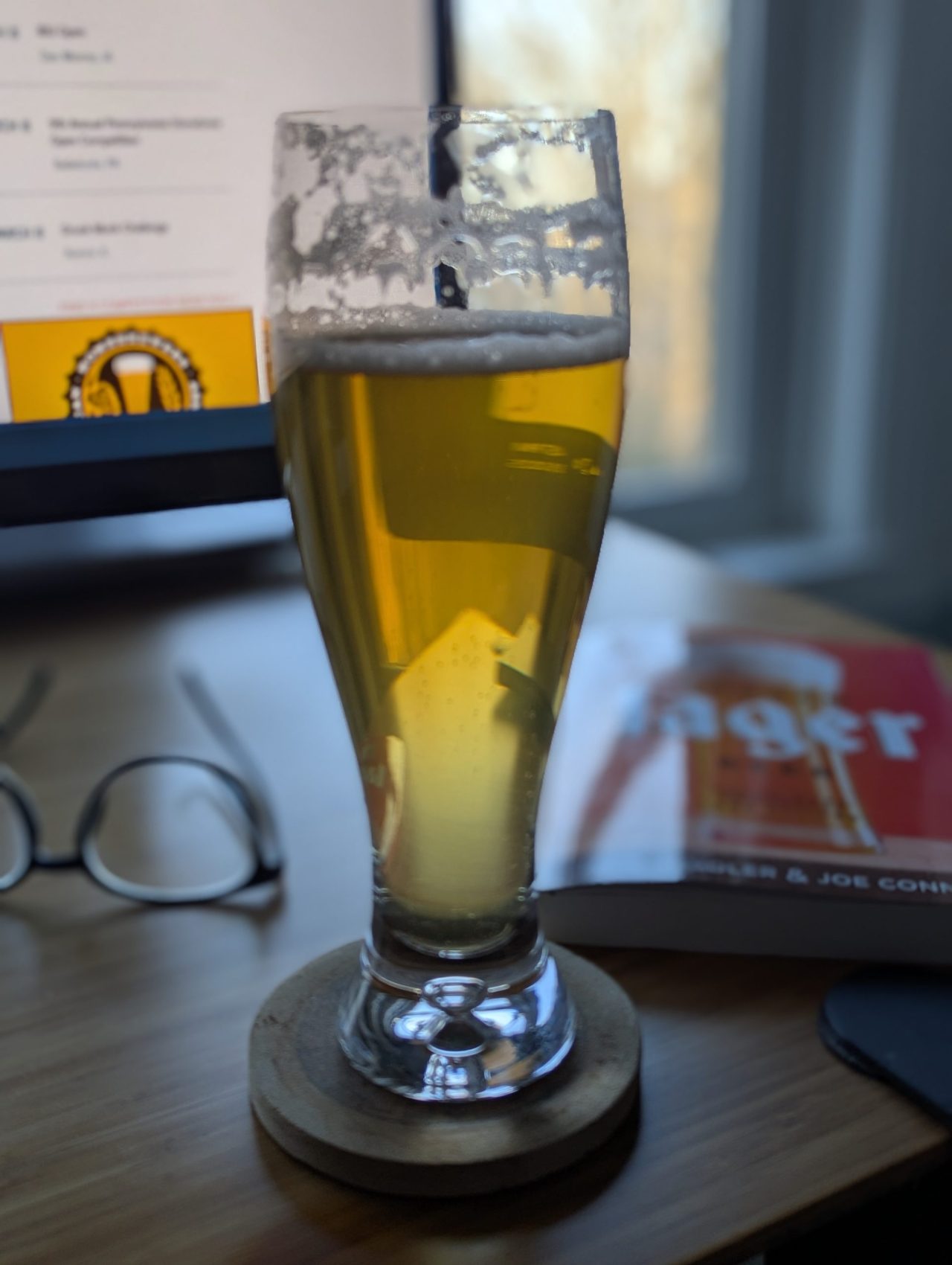 Photo of a Pilsner glass containing the Pre-Prohibition Lager